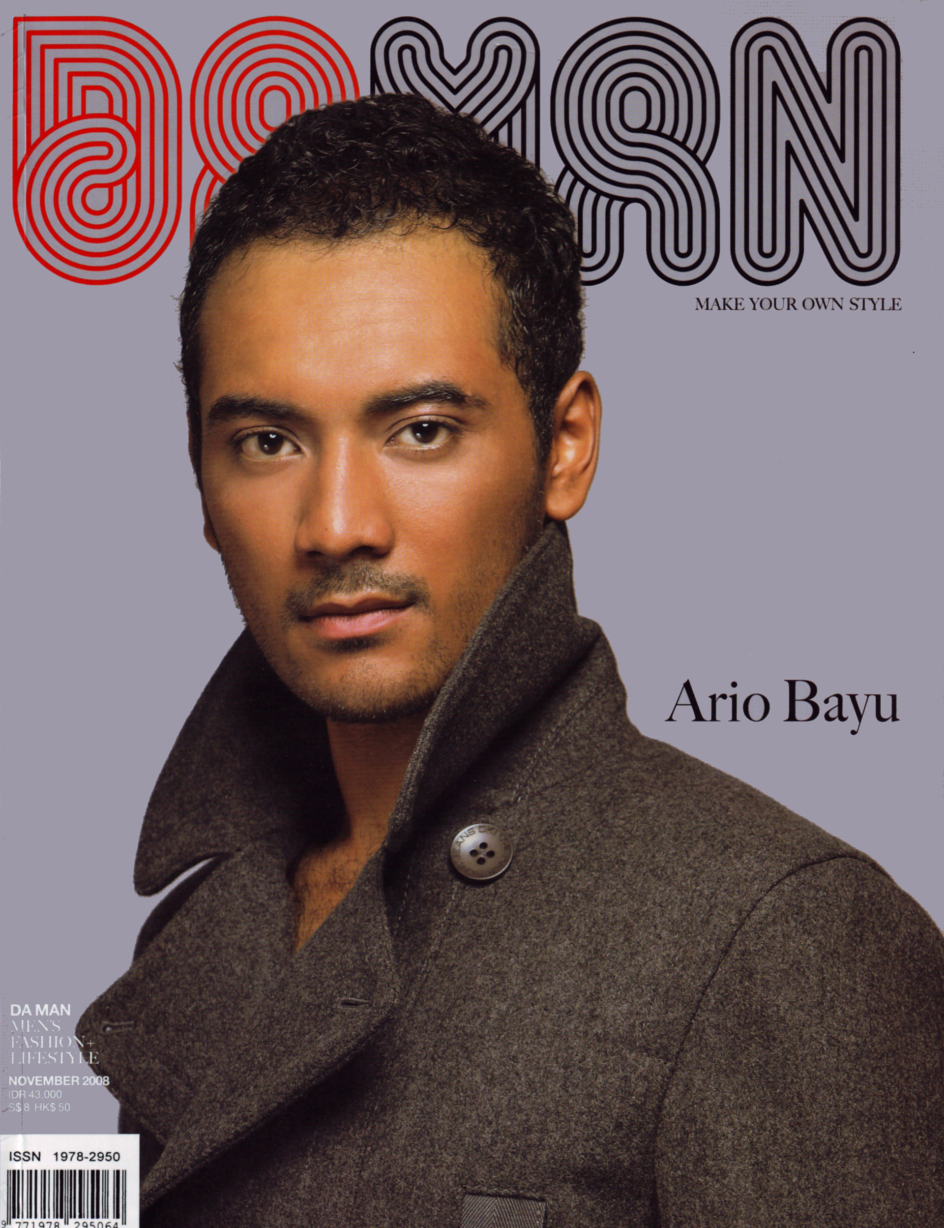 DA MAN cover with a portrait in a grey coat.